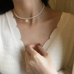 Elegant pearl necklace with golden letter W pendant inlaid with zircon for women