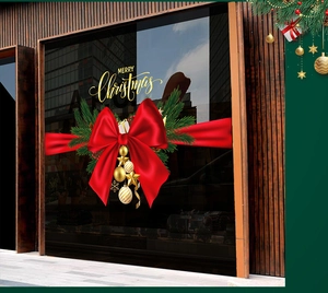 Detailed Christmas window sticker featuring red bows, pine branches, and golden ornaments
