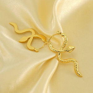18K gold-plated stainless steel snake earrings on silk background with textured scales