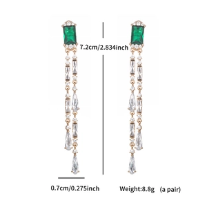 Detailed view of emerald drop earrings showing dimensions: 7.2cm length and 0.7cm width