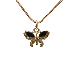 Golden butterfly necklace with black crystal pendant on a clean white background