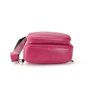 Fuchsia minimalist PU leather chest bag for women with metallic D-ring and strap detail