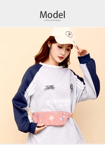 Detail of pink sports fanny pack with blue splash graffiti and large R letter detail