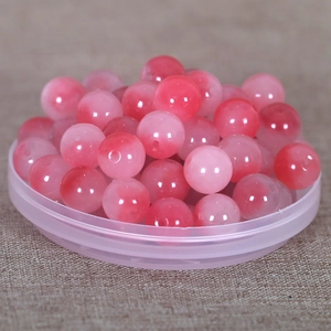 Stack of round pink gradient natural jade beads for DIY jewelry and bracelet making