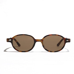 Classic oval tortoiseshell sunglasses with brown lenses and sleek vintage-style frame