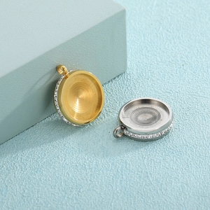 Polished stainless steel round pendant trays with sparkling crystals in gold and silver