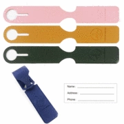 Set de cuatro etiquetas de silicona para maletas con iconos de avión y tarjetas de ID