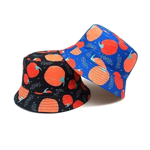 Chapeaux bob réversibles pour enfants avec imprimé citrouille orange en noir et bleu