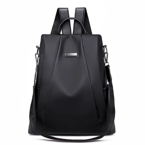 Modern black oxford anti-theft backpack for women with metal plate and sleek nylon finish