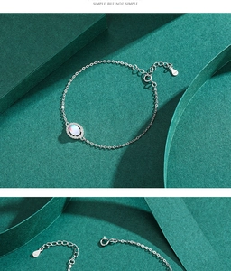 Detailed view of S925 sterling silver bracelet with oval moonstone and lobster clasp