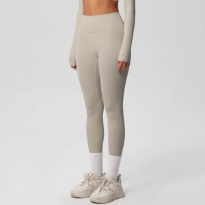 Detail view of high waist compression yoga leggings in light grey with tummy control fit