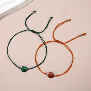 Handmade woven heart stone bracelets with malachite and gold sandstone pendants