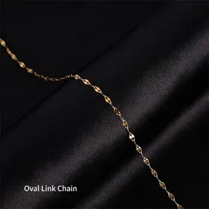 Elegant 18k gold plated titanium steel lip chain necklace on black silk background