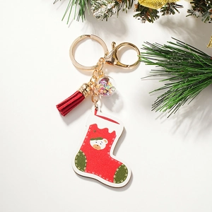 Christmas Santa Claus wooden keychain with red sock charm, tassel, and sequin ball