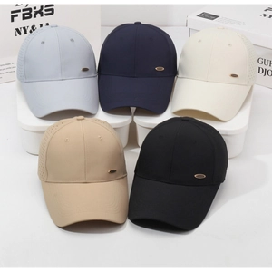 Detail showing five colors of mesh baseball caps with side laser-cut ventilation holes