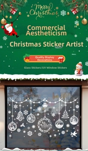 Detailed UV window stickers with white snowflakes, bells and stars for festive glass decor
