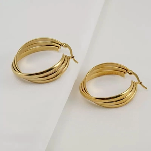 Classic three-layer twisted stainless steel hoop earrings with a gold-plated polished finish