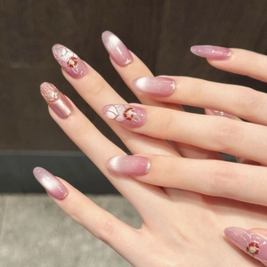 Mauve gradient cat-eye press-on nails with 3D embossed flowers and red gem accents
