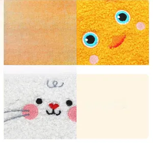 Close-up of premium sherpa plush fabric and fine embroidery on cute sanitary pouch