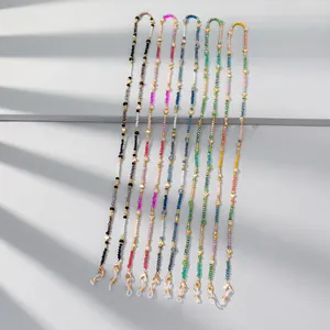 Colorful bohemian beaded eyewear chains with golden heart charms and lobster clasps