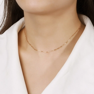 Minimalist 14K gold plated 925 sterling silver paperclip link necklace on a model