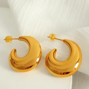 Polished chunky gold crescent earrings with steel and silicone backs for women