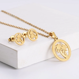 18k gold plated stainless steel jewelry set with hollow palm tree pendant and earrings