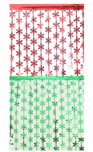 Close-up of red and green snowflake foil curtains for Christmas party background
