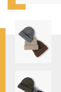 Detailed cable knit pattern and cuffed design on thick unisex winter beanies in earth tones