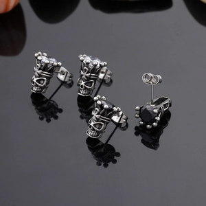 Retro punk skull crown earrings with sparkling zircons and a vintage steel finish