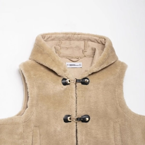 Chic beige faux fur hooded vest with black leather buckles and golden metal accents