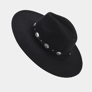 Detailed view of the black wool fedora with engraved silver studs on the leather band
