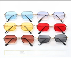 Collection of rimless ocean-tinted sunglasses in six colors with gold metal temples