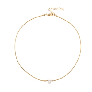 Elegant gold snake chain necklace featuring a white pearl pendant on white background