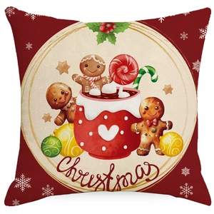 Christmas cushion cover with red festive prints like gingerbread man and snowflakes