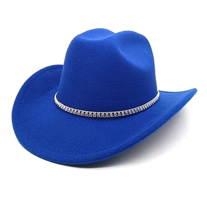 Detailed top view of a royal blue wool felt cowboy hat with sparkling diamond trim