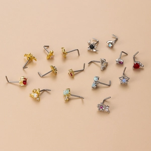 L-shaped nose studs with heart, star and flower designs in gold and silver plating
