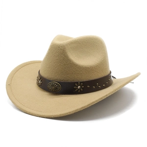 Close-up of beige felt cowboy hat with leather band and vintage metal studs