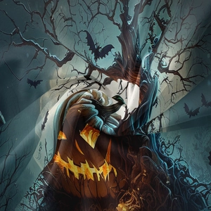 Detail of Halloween tapestry fabric featuring glowing pumpkin and bat pattern print