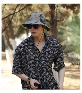 Detail of outdoor sun hat with adjustable strap and wide brim for men's casual hiking