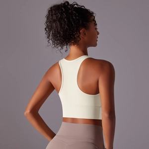 Detail of racerback sports bra in off-white showing elastic fit and muscle support