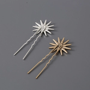 Paire de barrettes soleil avec strass scintillants en finitions dorée et argentée