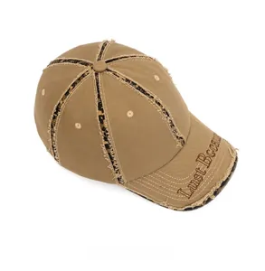 Top view of khaki cotton baseball cap featuring leopard print accents and raw edge detail