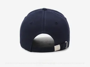 Detail of navy blue baseball cap back with adjustable silver metal buckle closure