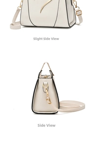 Detail view of cream PU leather handbag with gold accents and black edge finishing