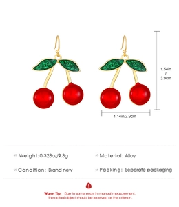 Detailed view of red cherry drop earrings with dimensions 3.9cm by 2.9cm and alloy material