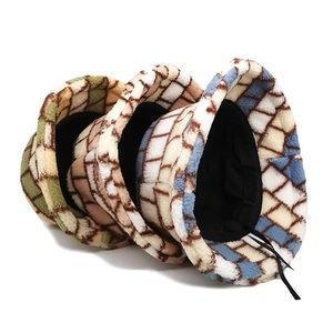 Winter faux lamb wool checkerboard bucket hats in green, blue, and brown plaid patterns