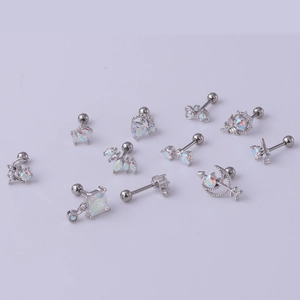 Detailed set of 10 surgical steel cartilage earrings with AB iridescent zircon and moon motifs