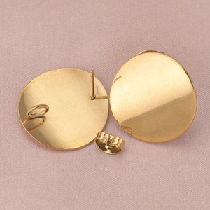 Golden round ball stud earrings with DIY loop and butterfly back on satin background