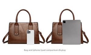 Brown crocodile pattern tote bag size comparison with iPhone and iPad in a studio setting